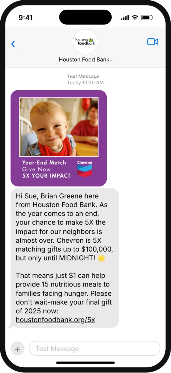 Text message from Houston Food Bank: a Year-End Match MMS with a smiling toddler and the Chevron logo, explaining that Chevron is matching gifts 5x up to $100,000 until midnight and that $1 provides 15 meals.
