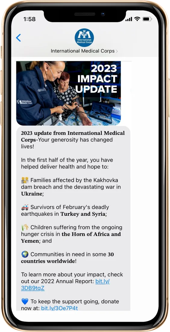 Text message from International Medical Corps: a 2023 Impact Update MMS showing a clinician taking a patient's blood pressure, with a breakdown of donor impact in Ukraine, Turkey and Syria, the Horn of Africa and Yemen.